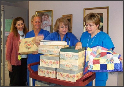 Nurses Looking at Angel Fund Memory Boxes
